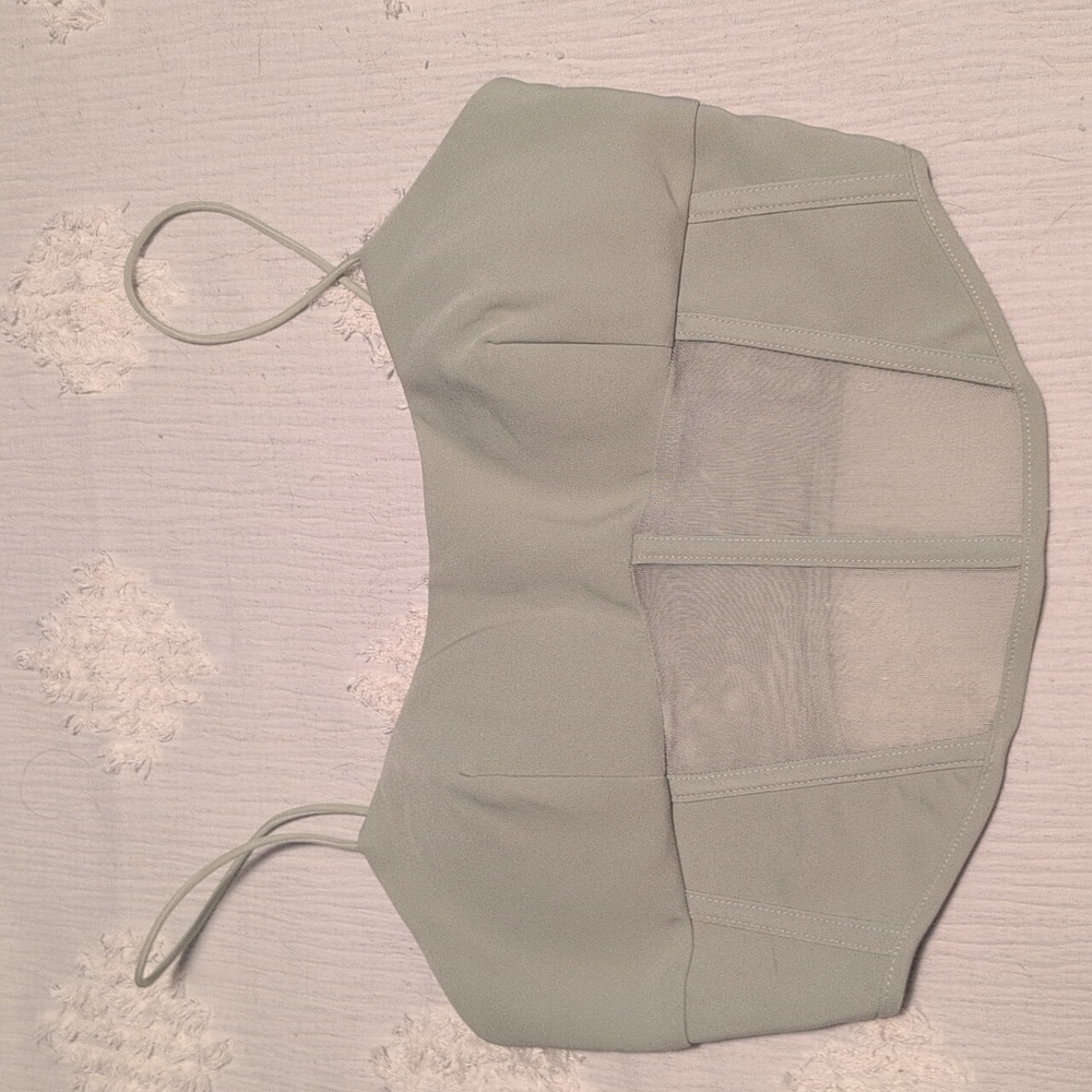 Light green corset top with pads